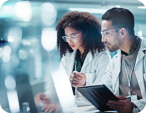 engineers looking on a computer screen together
