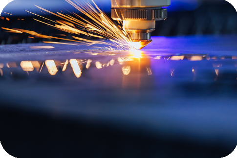 Blue color Laser CNC cut of metal with light spark