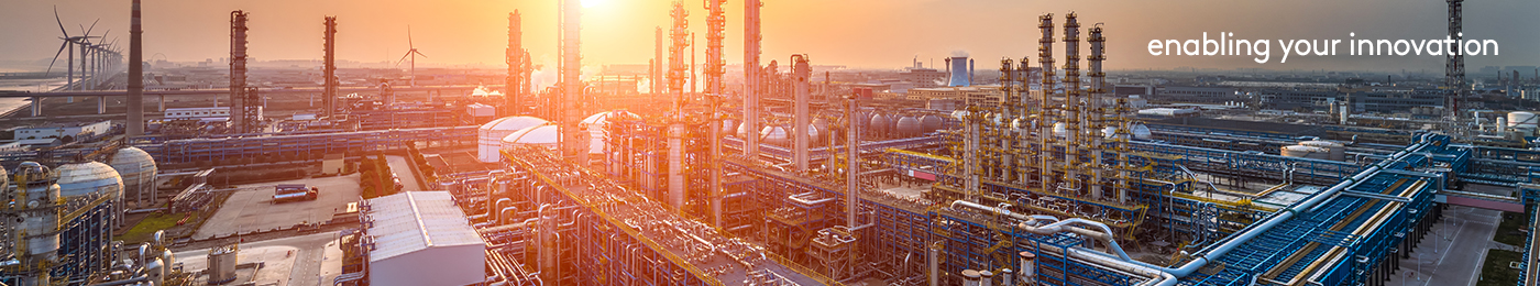 Industrial skyline with sunrise
